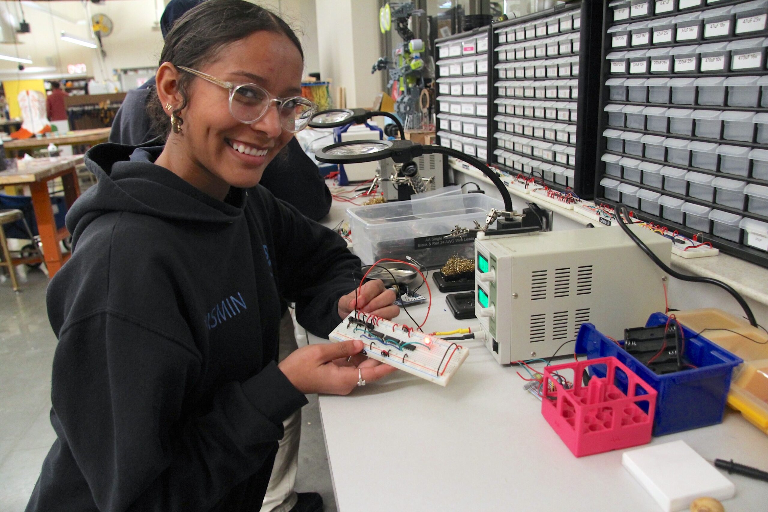 Engineering student working on an electronics project